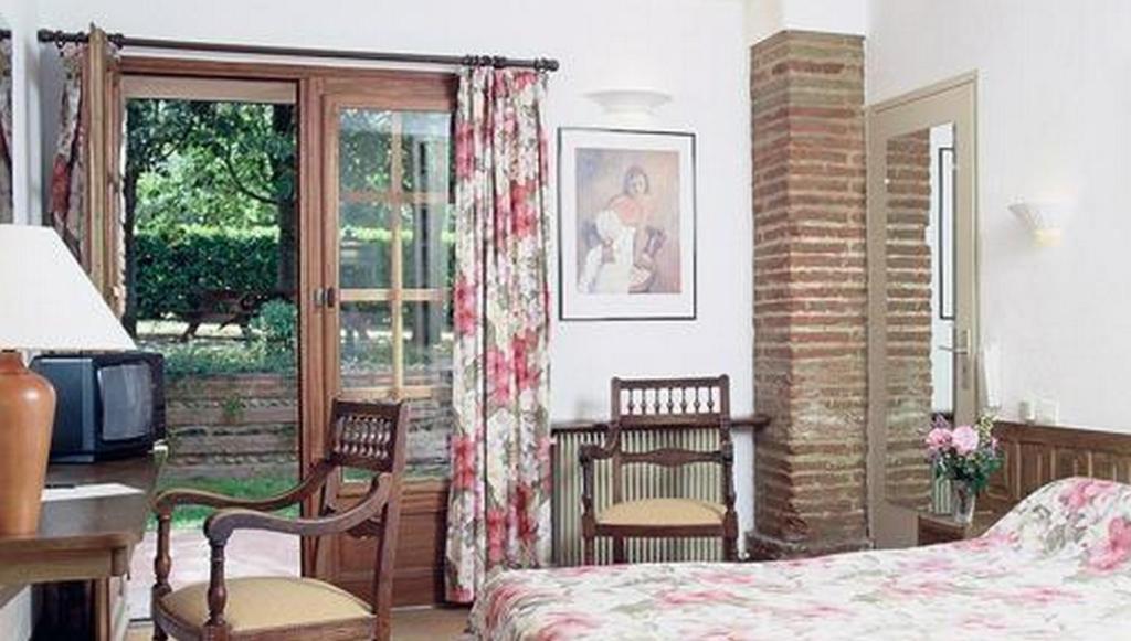 Hotel Le Ratelier Montaigut-sur-Save Habitación foto
